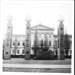 Photograph of the exterior of a building in Munich, Germany displaying a Nazi propaganda banner, 1937 by Thomas F. Lambert