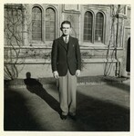 Photograph of Thomas F. Lambert in front of a building at Jesus College, Oxford, 1937 by Unknown