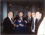 Members of the Massachusetts congressional delegation present Cuban President Fidel Castro with a Boston Red Sox jacket during trip to Cuba, 1998 by unknown