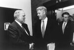 Congressman John Joseph Moakley shakes hands with President Bill Clinton during his visit to Boston, 19 February 1997 by unknown