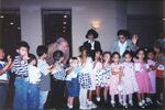 John Joseph Moakley with children in El Salvador, November 1997 by unknown