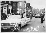 John Joseph Moakley and Evelyn Moakley walking in Saint Patrick's Day parade in South Boston, circa 1960 by unknown