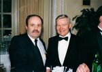 William Bulger (at right, in bowtie) with unidentified man at John Joseph Moakley's Silver Jubilee event by unknown