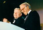 William M. Bulger (left) and John Joseph Moakley smiling at the podium at the Salute to Moakley event by Focused Images-ARR