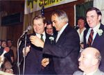 William M. Bulger and others at the microphone at Saint Patrick's Day event in South Boston, Mass., 1970s by unknown