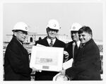 Tour of the Ted Williams Tunnel in Boston, Mass: Representative Norman Mineta (D-CA), John Joseph Moakley, and Thomas M. Menino in hard hats by unknown