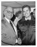 Tour of the Ted Williams Tunnel in Boston, Mass: John Joseph Moakley shaking hands with unidentified man by unknown