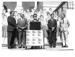 John Joseph Moakley, Fawn Evenson and others on the Capitol steps at a Support of the Textile Act Support Rally, 1980s by unknown