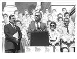 John Joseph Moakley, Fawn Evenson and others on the Capitol steps at a Support of the Textile Act Rally, 1980s by unknown