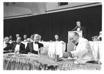 Walter Mondale at the podium of a political event at the Washington Hilton with Congressmen John Joseph Moakley and Thomas P. "Tip" O'Neill, 1980s by unknown