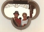 Congressman John Joseph Moakley and Evelyn Moakley looking out of a Chinese style building on a congressional trip to China by unknown