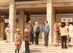 Members of a 1983 congressional delegation to China and Chinese officials gather in front of a building by unknown